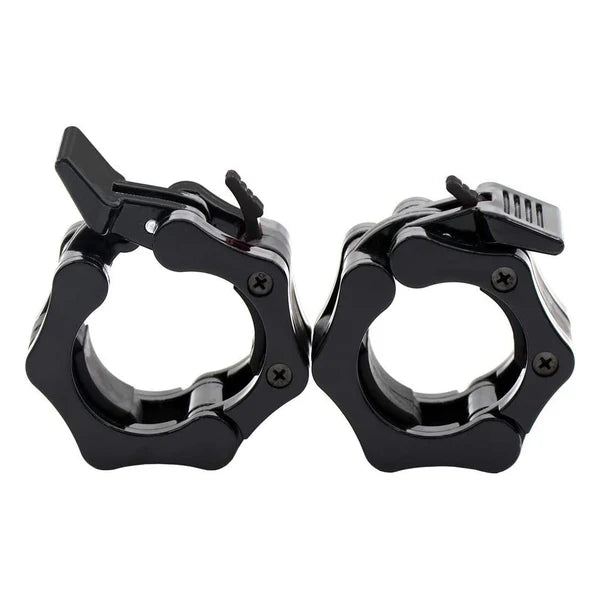 Pair of black and silver handcuffs on a white background