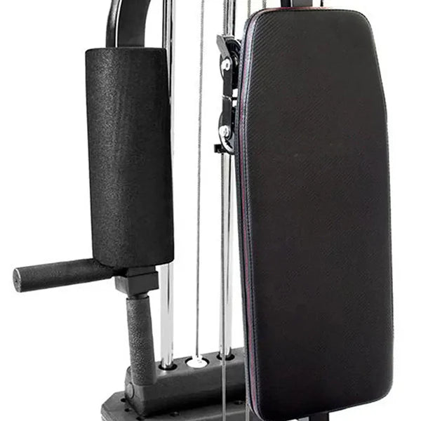 Black gym machine with padding on a white background