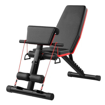 Black adjustable weight bench with red accents on a white background