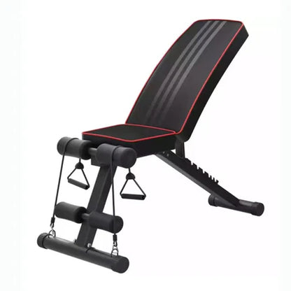 Black adjustable weight bench with red accents on a white background