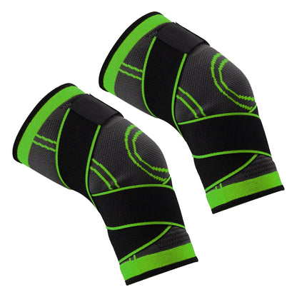 Pair of black and green knee sleeves on a white background