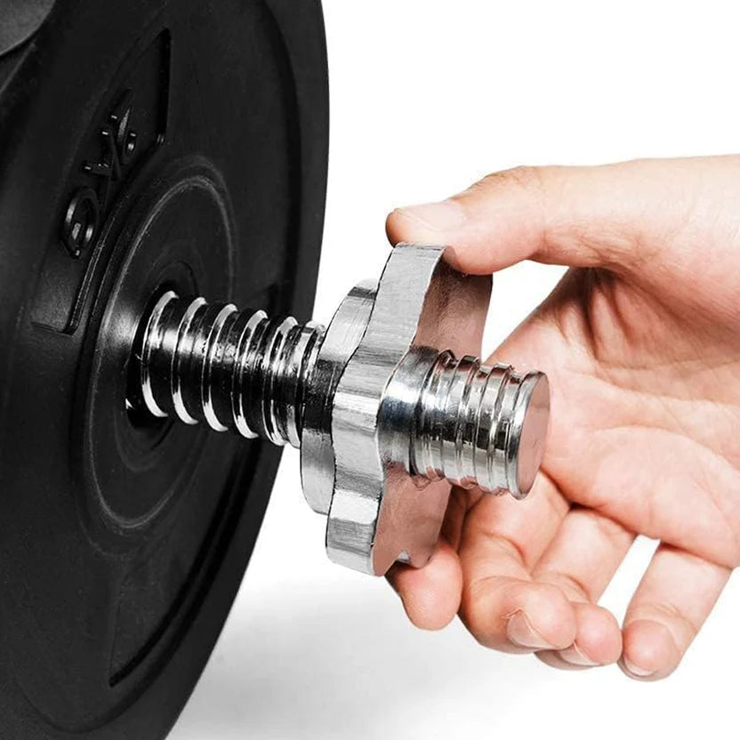 Hand using a metal tool on a wheel, likely for maintenance or repair.
