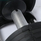 Close-up of a metal mesh filter inside a vehicle's air intake system.