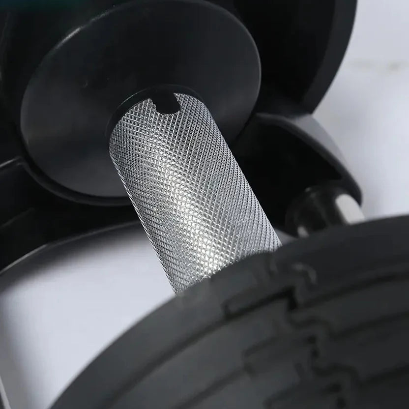 Close-up of a metal mesh filter inside a vehicle's air intake system.
