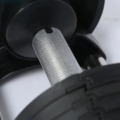 Close-up of a metal mesh filter inside a vehicle's air intake system.