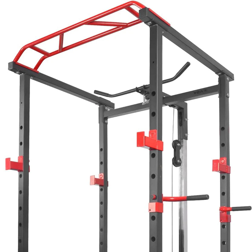 Black and red fitness power rack on a white background