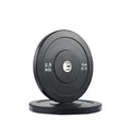 Pair of black weight plates with '2.5 KG' marking on a white background