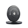 Black weight plate with '5 KG' marking on a white background