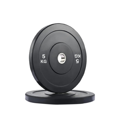 Black weight plate with '5 KG' marking on a white background