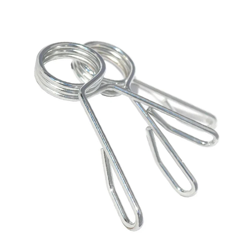 Metal spring clips on a white background