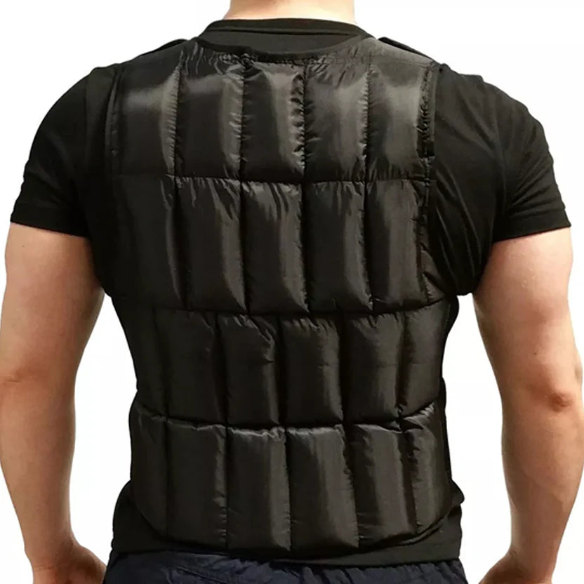 Black puffer vest worn by a person on a white background
