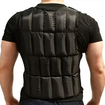 Black puffer vest worn by a person on a white background